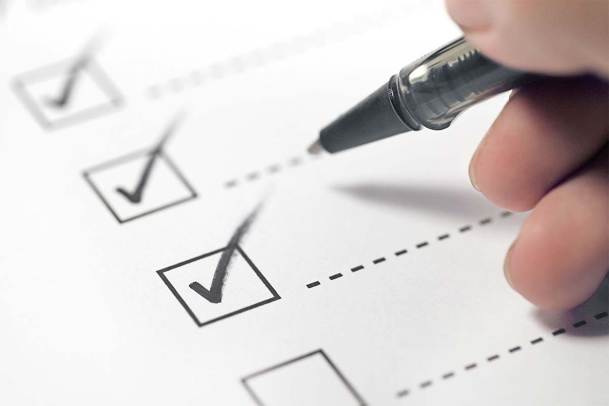 checklist with a pen